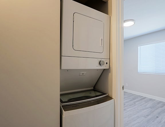 A white dishwasher is installed in a kitchen.